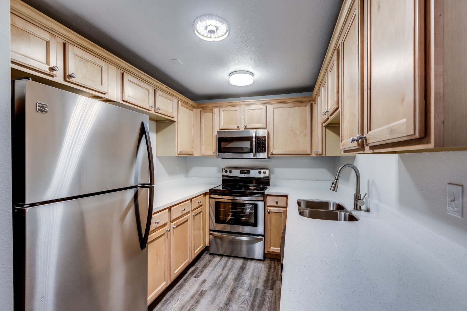 Updated kitchen with ample counter space at The Preserve at Forbes Creek in Kirkland, Washington