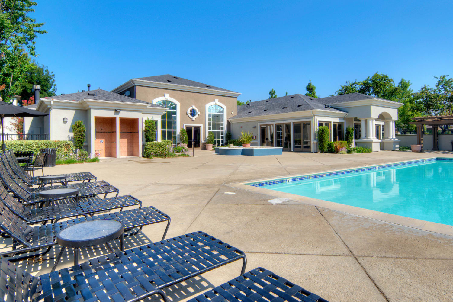 An inviting swimming pool at Park Hacienda Apartments in Pleasanton, California