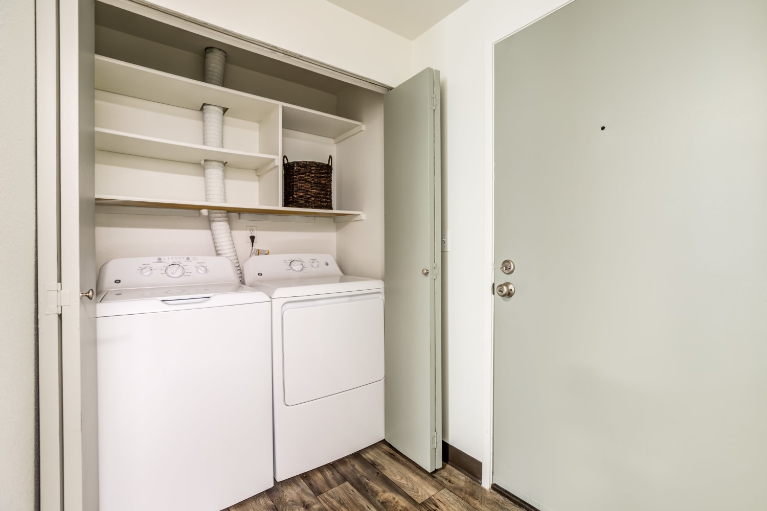 Washer and dryer in unit at Metropolitan Park Apartments in Seattle, Washington