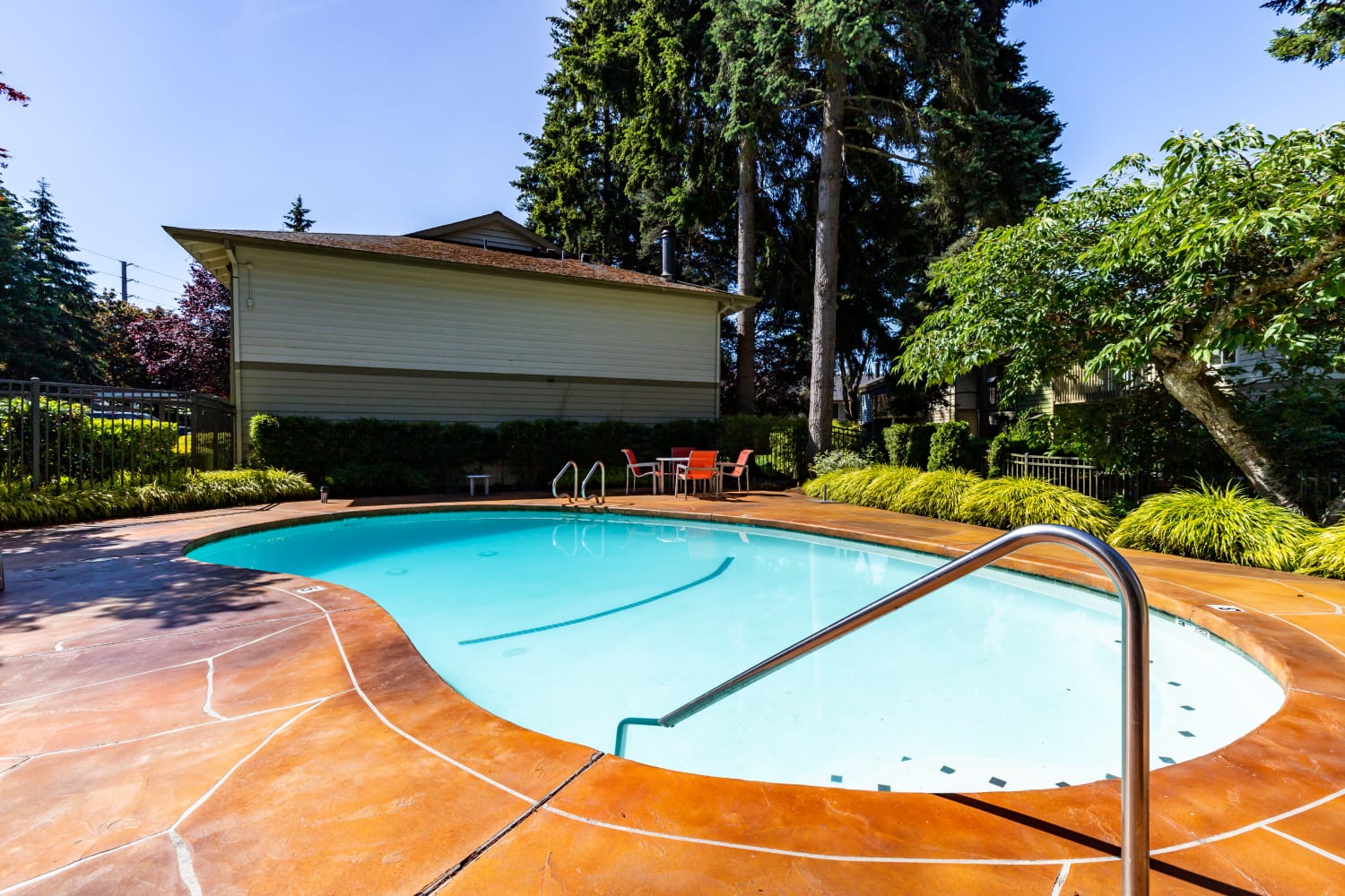 Outdoor community pool at Edgewood Park Apartments in Bellevue, Washington