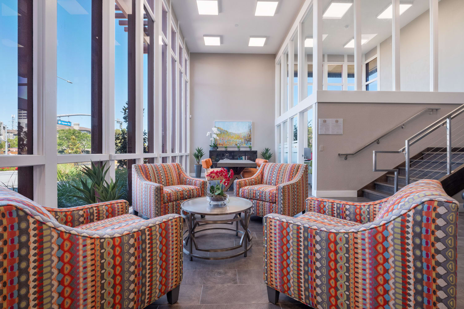 Comfy seating area with a view at Harbor Cove Apartments in Foster City, California