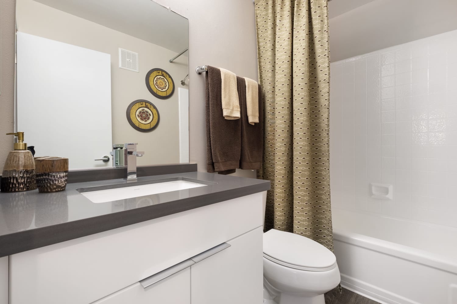 Modern decorated bathroom at Harbor Cove Apartments in Foster City, California