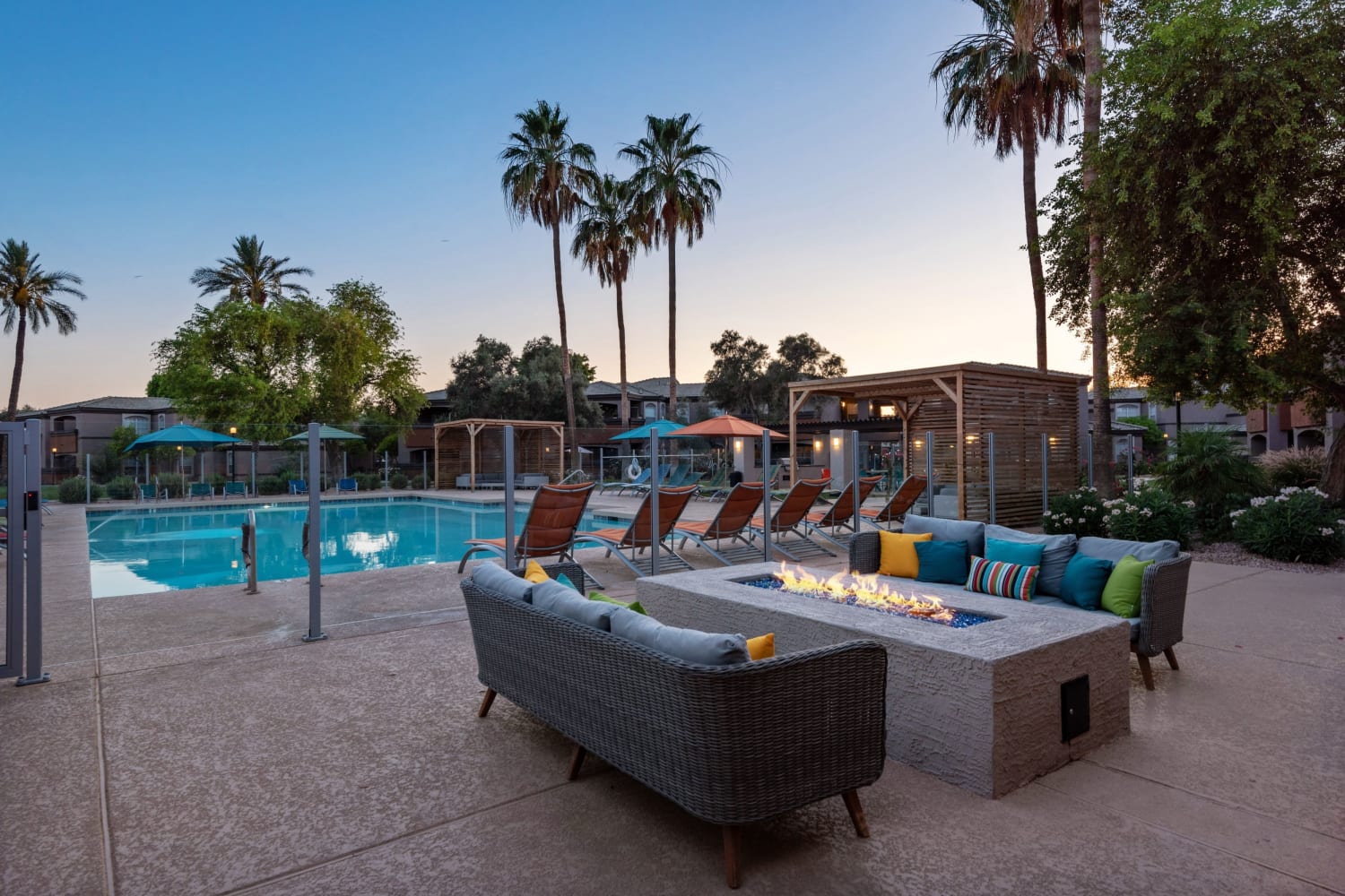 Poolside seating by the firepit at Luxe @ Ocotillo in Chandler, Arizona