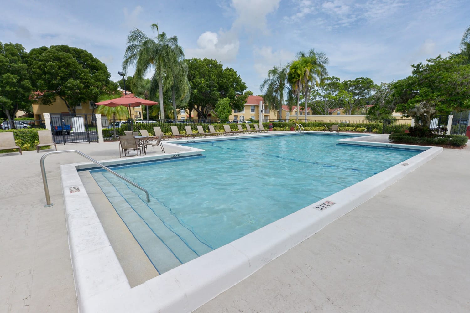 Swimming pool at Savannah Place Apartments & Townhomes in Boca Raton, Florida