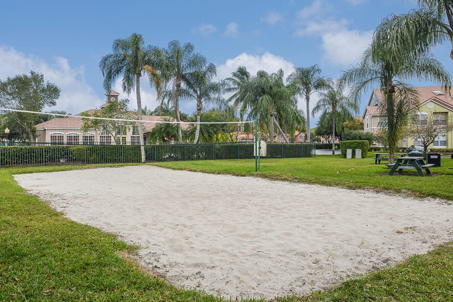 Sand volleyball court at Royal St. George at the Villages Apartment Homes in West Palm Beach, Florida