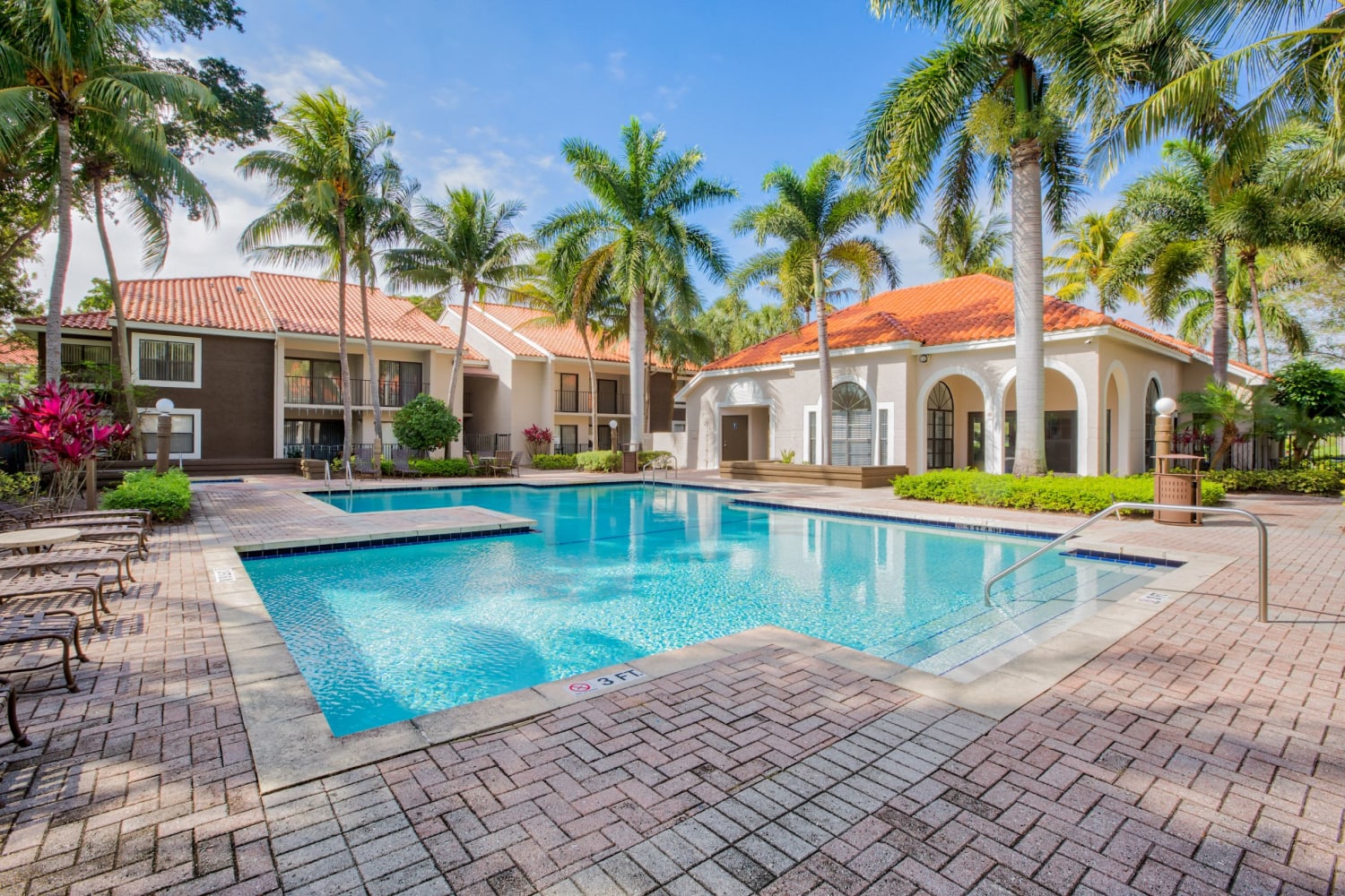 Sparkling pool at Village Place Apartment Homes in West Palm Beach, Florida