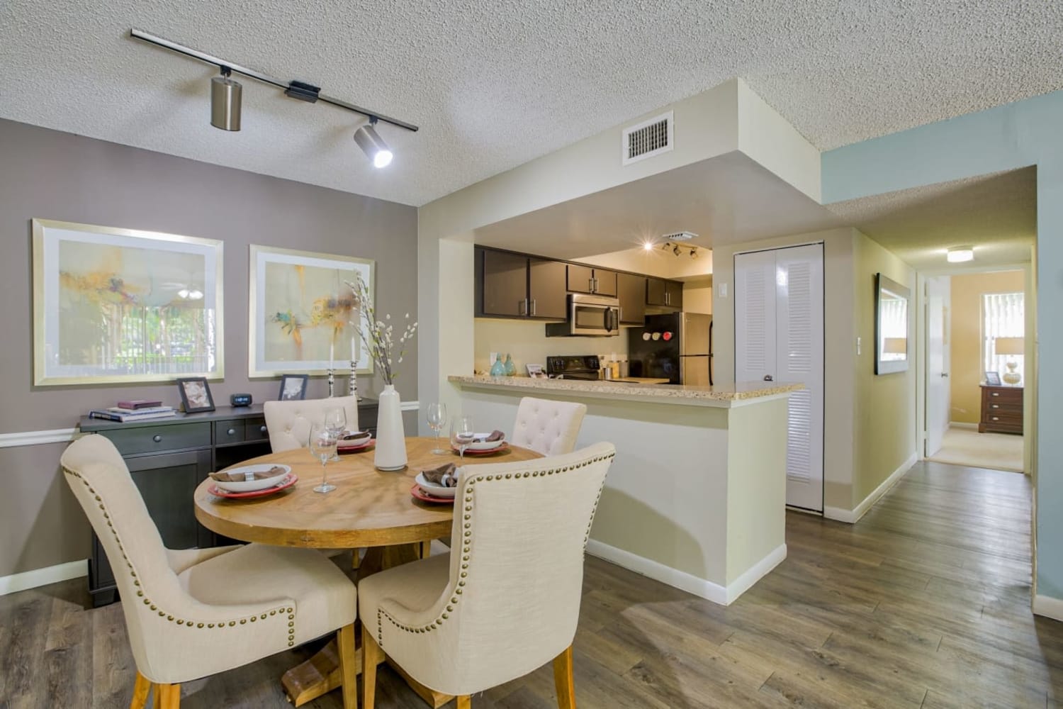 Spacious apartment with wood flooring at Village Place Apartment Homes in West Palm Beach, Florida