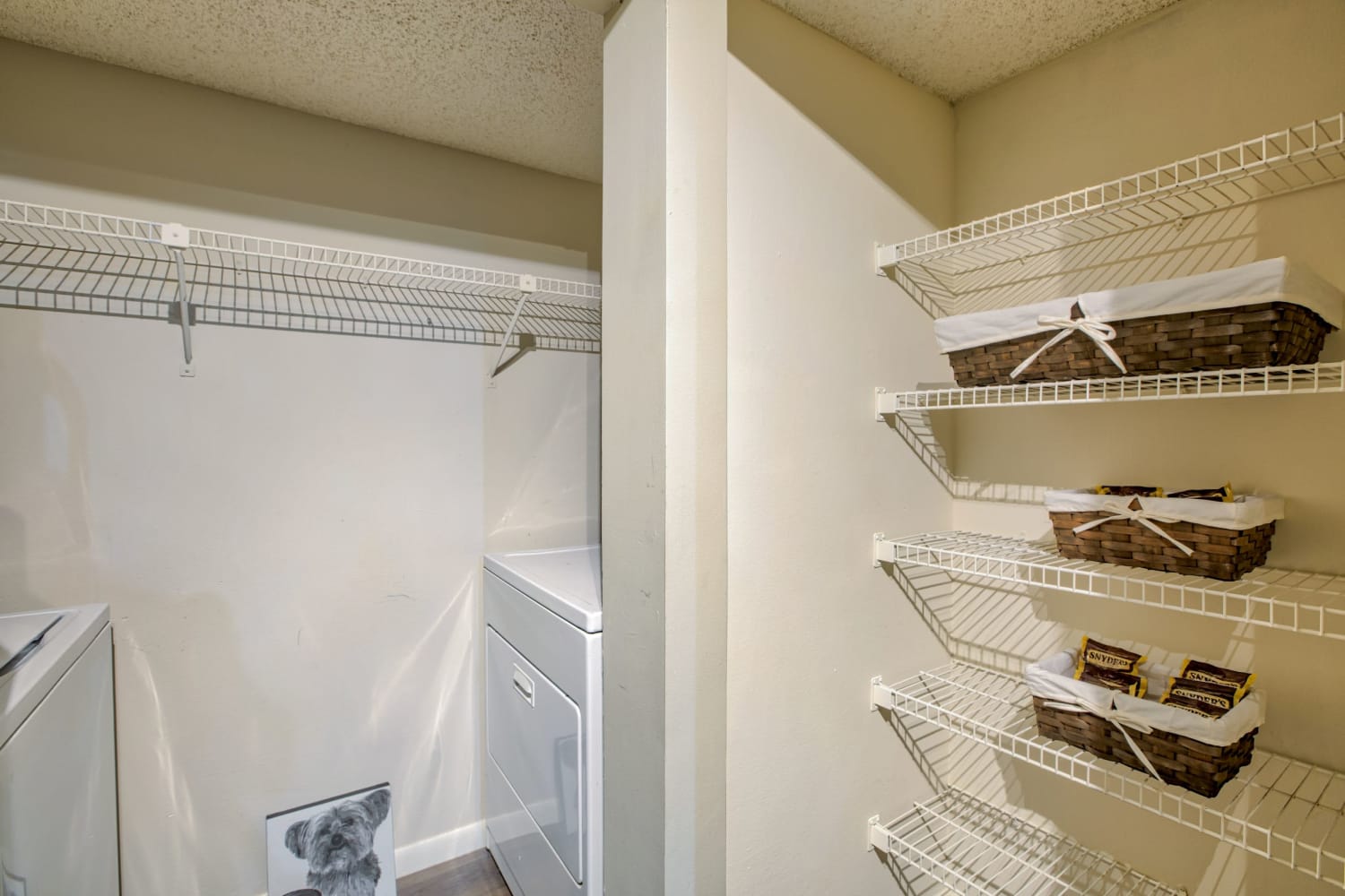 Walk-in closet at Village Place Apartment Homes in West Palm Beach, Florida
