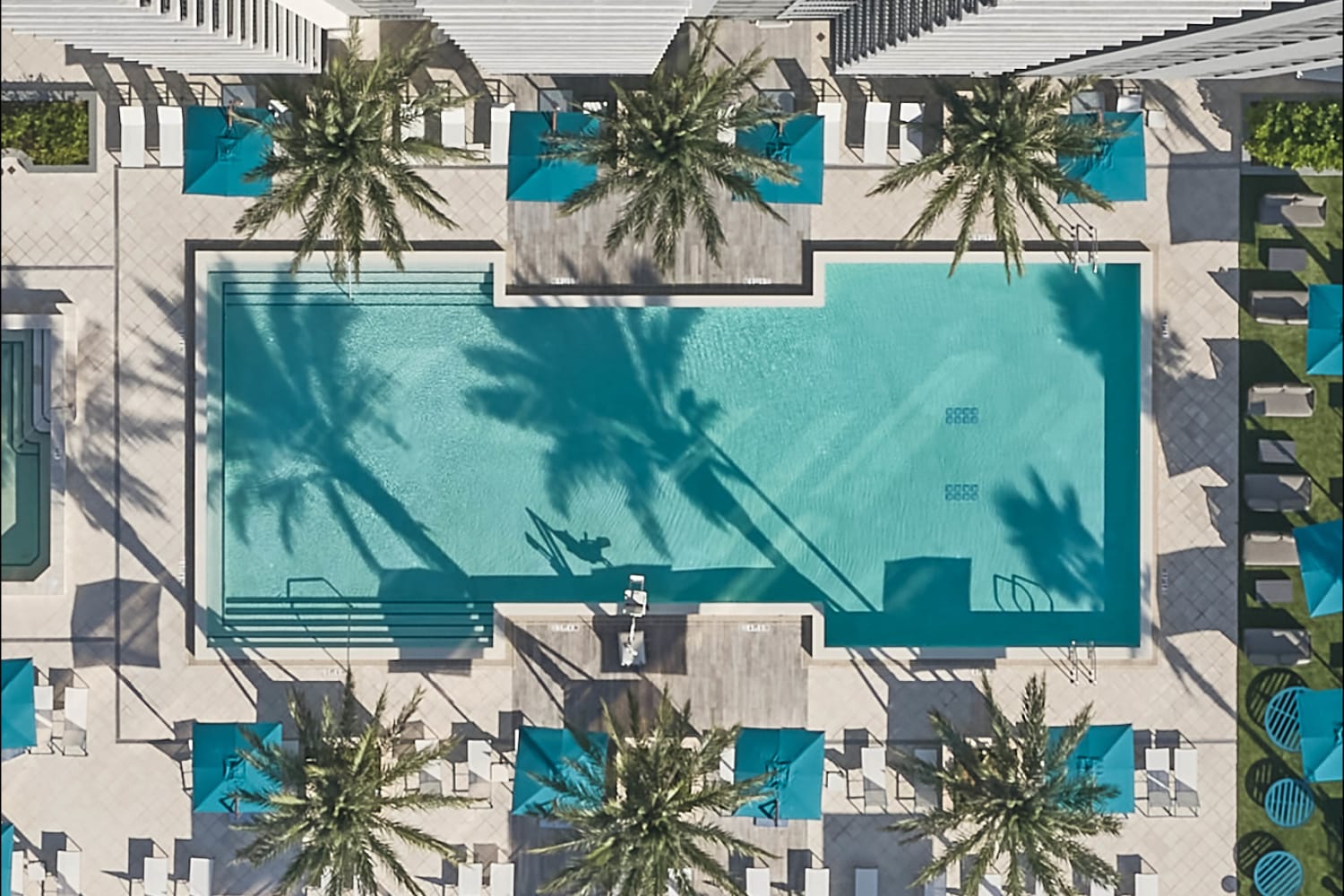 Top down view of a resort style pool at ParkLine Miami in Miami, Florida
