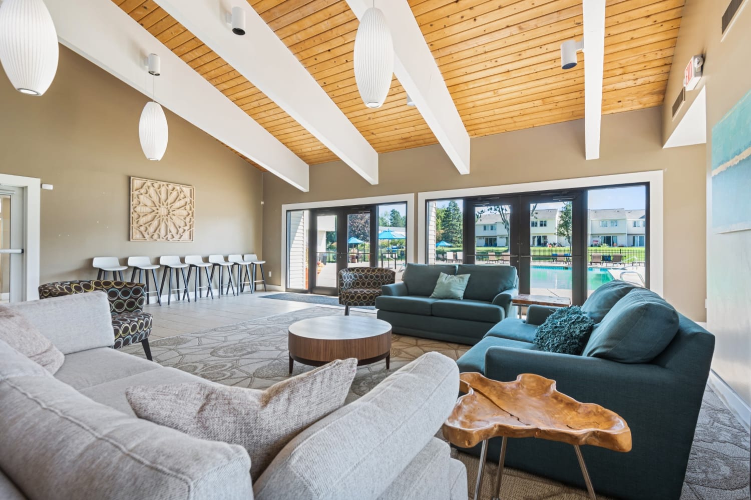 Comfortable resident clubhouse sitting area at Penbrooke Meadows in Penfield, New York
