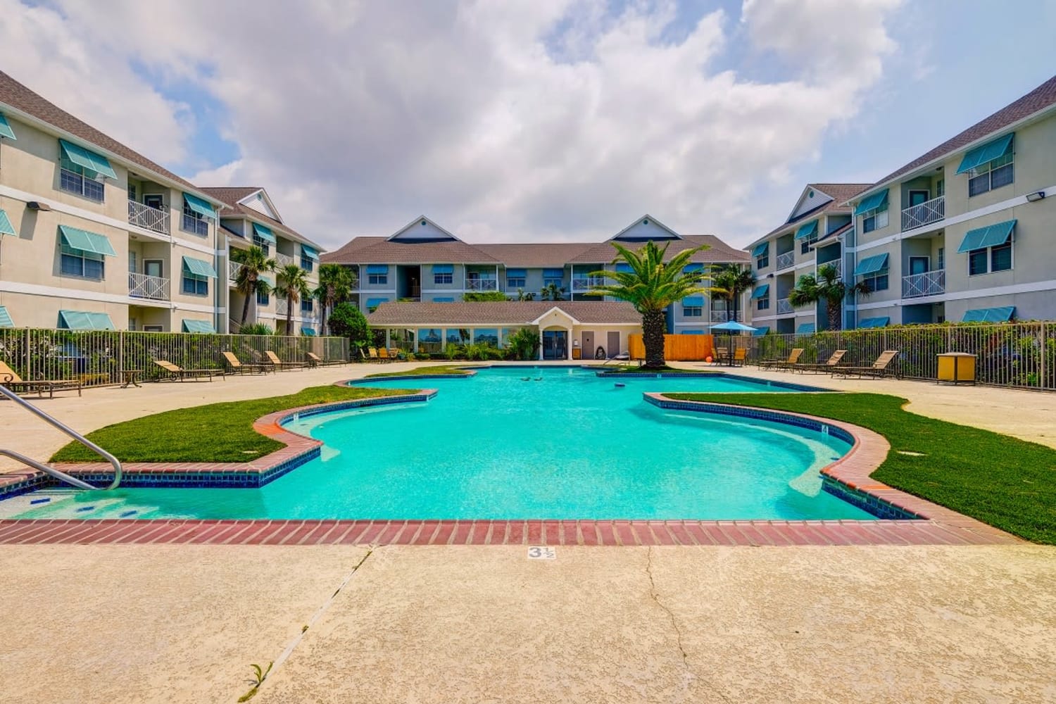 Beautiful skies and spacious pools at Harborside Apartment Homes in Slidell, Louisiana