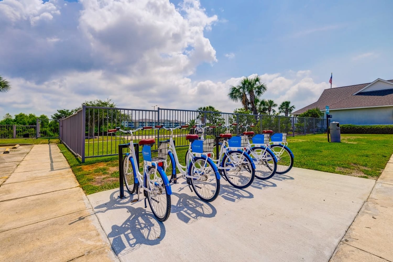 Community bikes and a walking path at Harborside Apartment Homes in Slidell, Louisiana