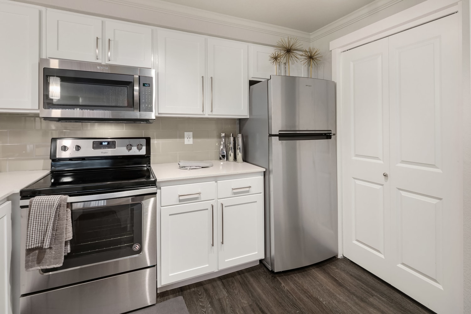 Stainless steel kitchen appliances in an apartment at Overlook at Lakemont in Bellevue, Washington