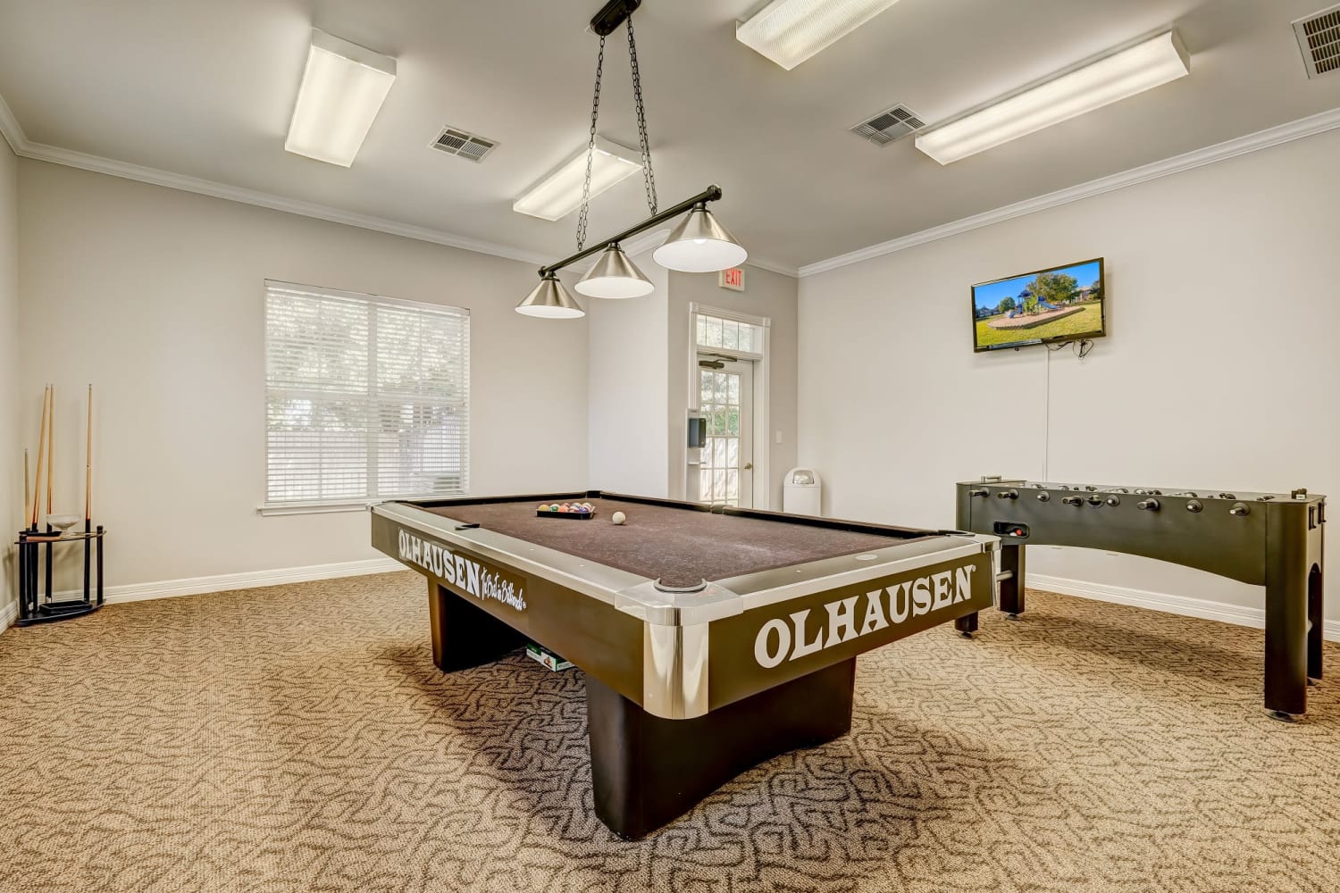 Resident billiards room with pool table at Audubon Lake Apartments
