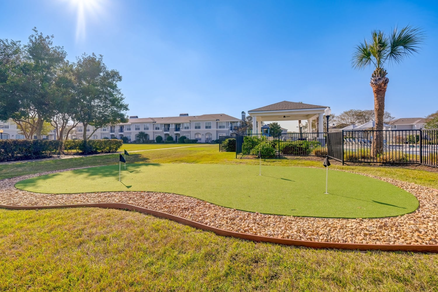 Putting green at Chateau des Lions Apartment Homes in Lafayette, Louisiana