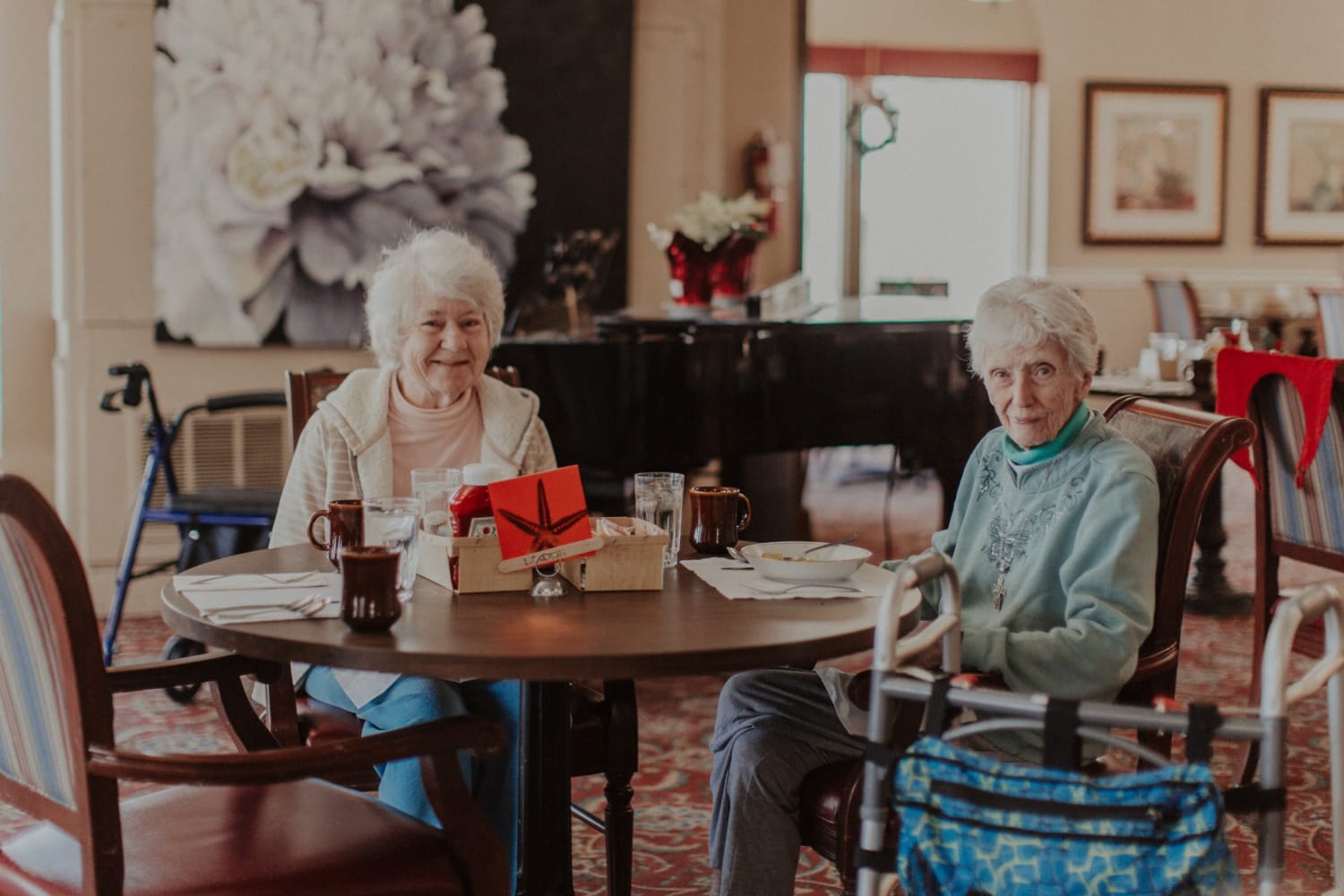 2 residents dining together at The Whitcomb Senior Living Tower in St. Joseph, Michigan