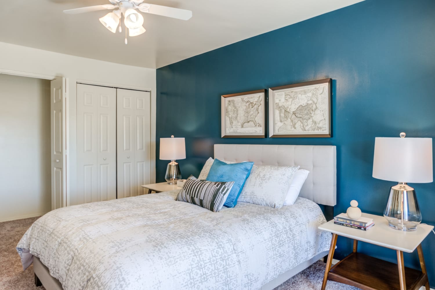 Master bedroom with a ceiling fan at Greentree Village Townhomes in Lebanon, Pennsylvania