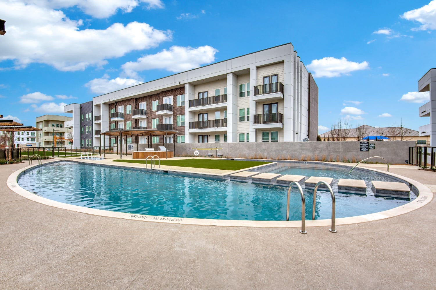 Beautiful resort-style pool at Mezzo Apartments in Aubrey, Texas