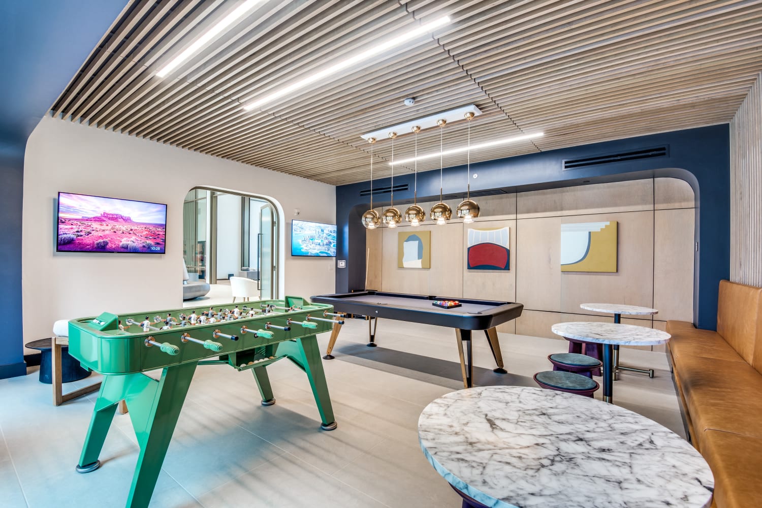 Billiard/game room at Mezzo Apartments in Aubrey, Texas