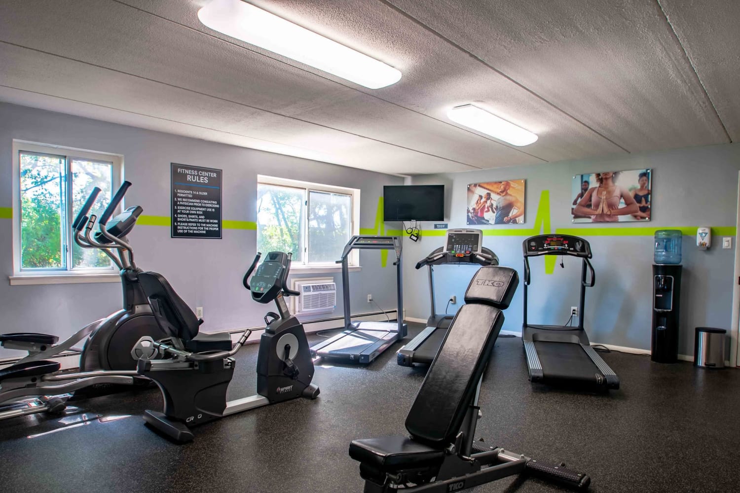 Fitness center with equipment at Camp Hill Plaza Apartment Homes in Camp Hill, Pennsylvania