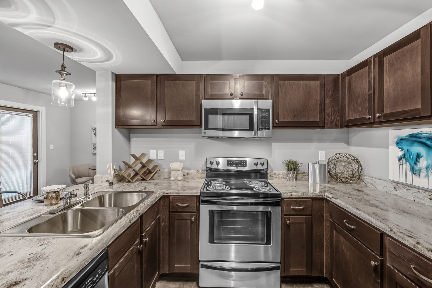 Inspiring kitchens with stainless-steel appliances at Palisades at Pleasant Crossing in Rogers, Arkansas