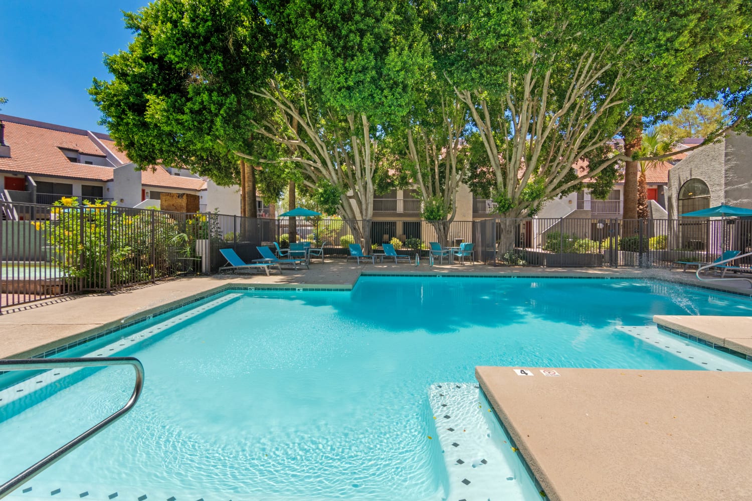 Community outdoor pool at Waterford Place Apartments in Mesa, Arizona