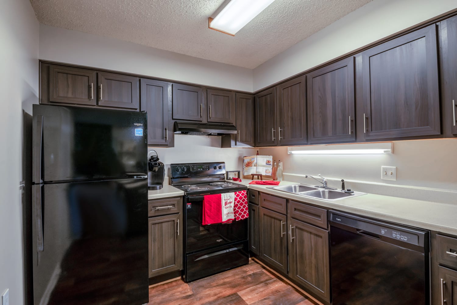 Kitchen of a model home at River Park Tower Apartment Homes in Newport News, Virginia