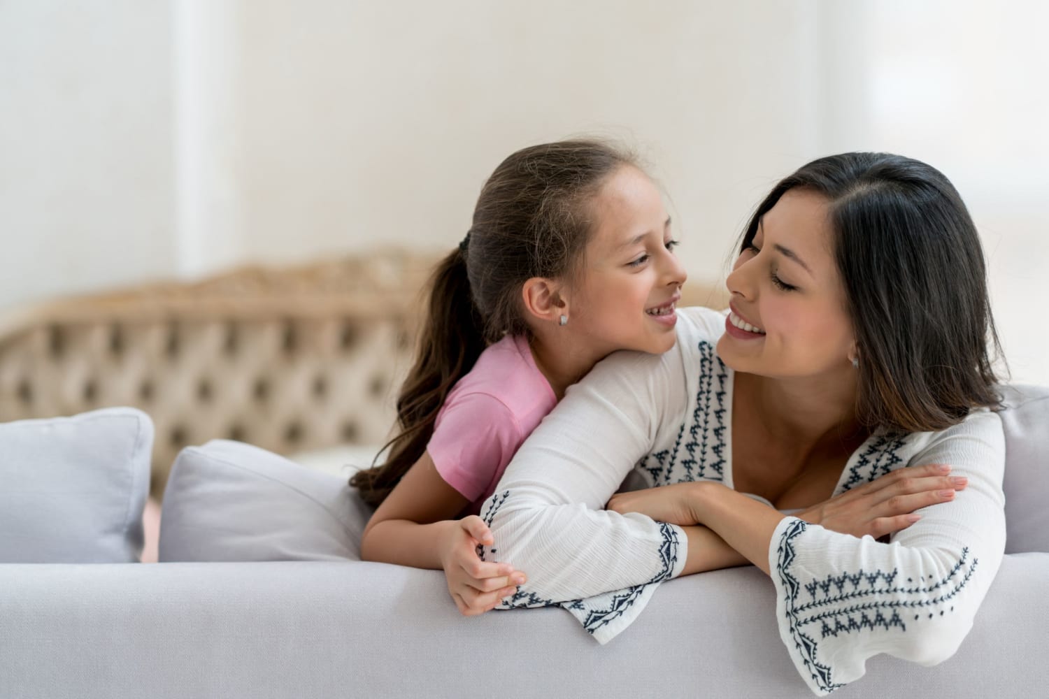 Happy mother and her kid at La Pro Apartments in Los Angeles, California