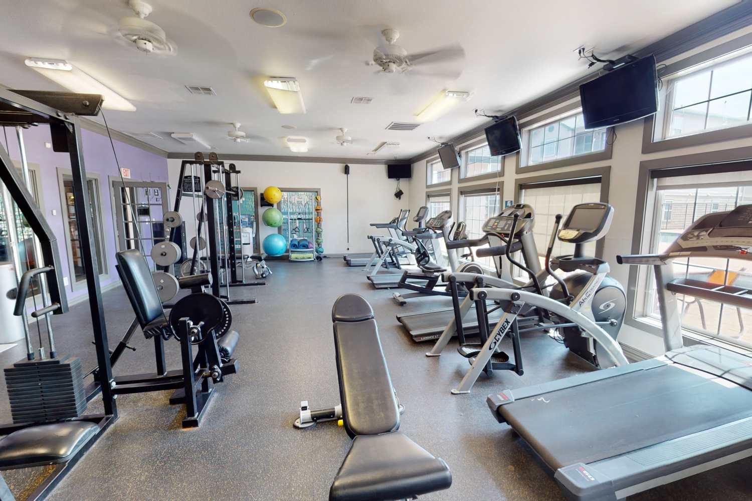 Fitness center with cardio equipment at The Quarters at Lincoln in Lincoln, Nebraska
