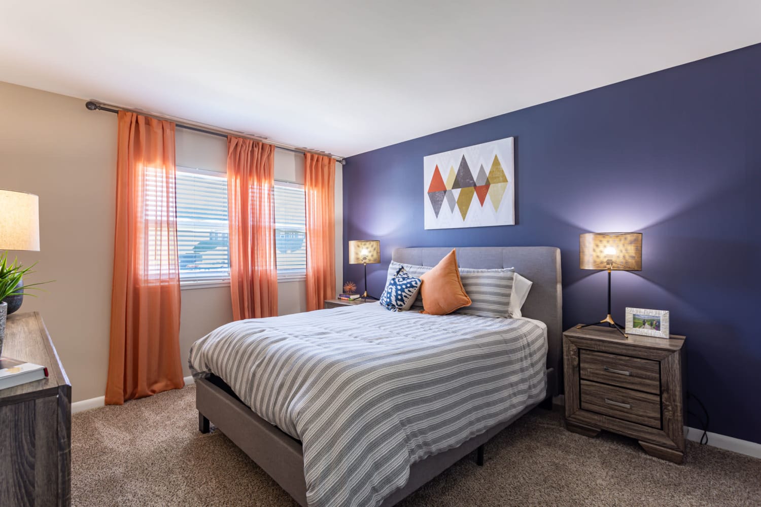 Luxurious and spacious bedroom with access to natural lighting at Mallards Landing Apartment Homes in Nashville, Tennessee