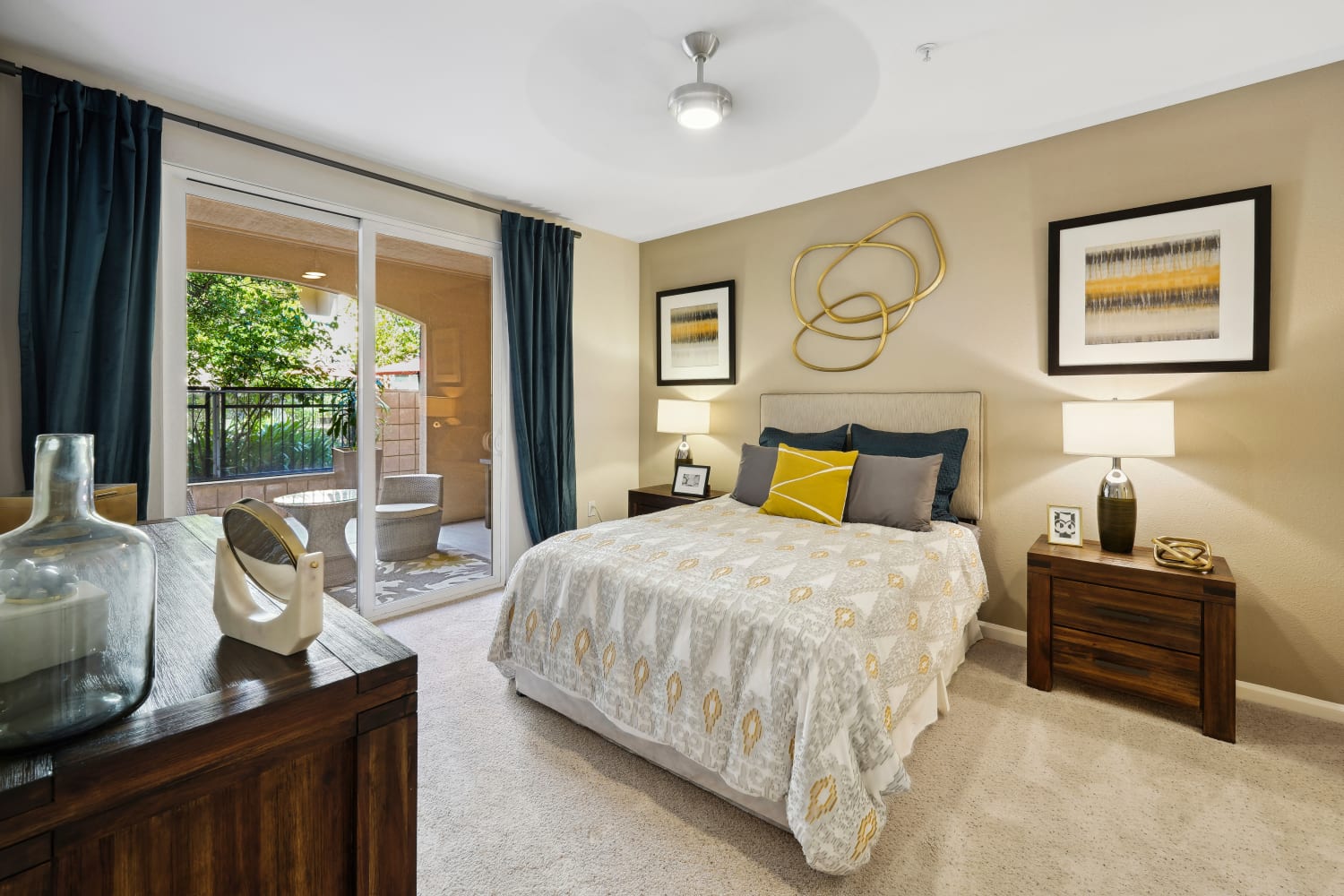 Enjoy a sunlit bedroom at Villa Del Sol in Sunnyvale, California