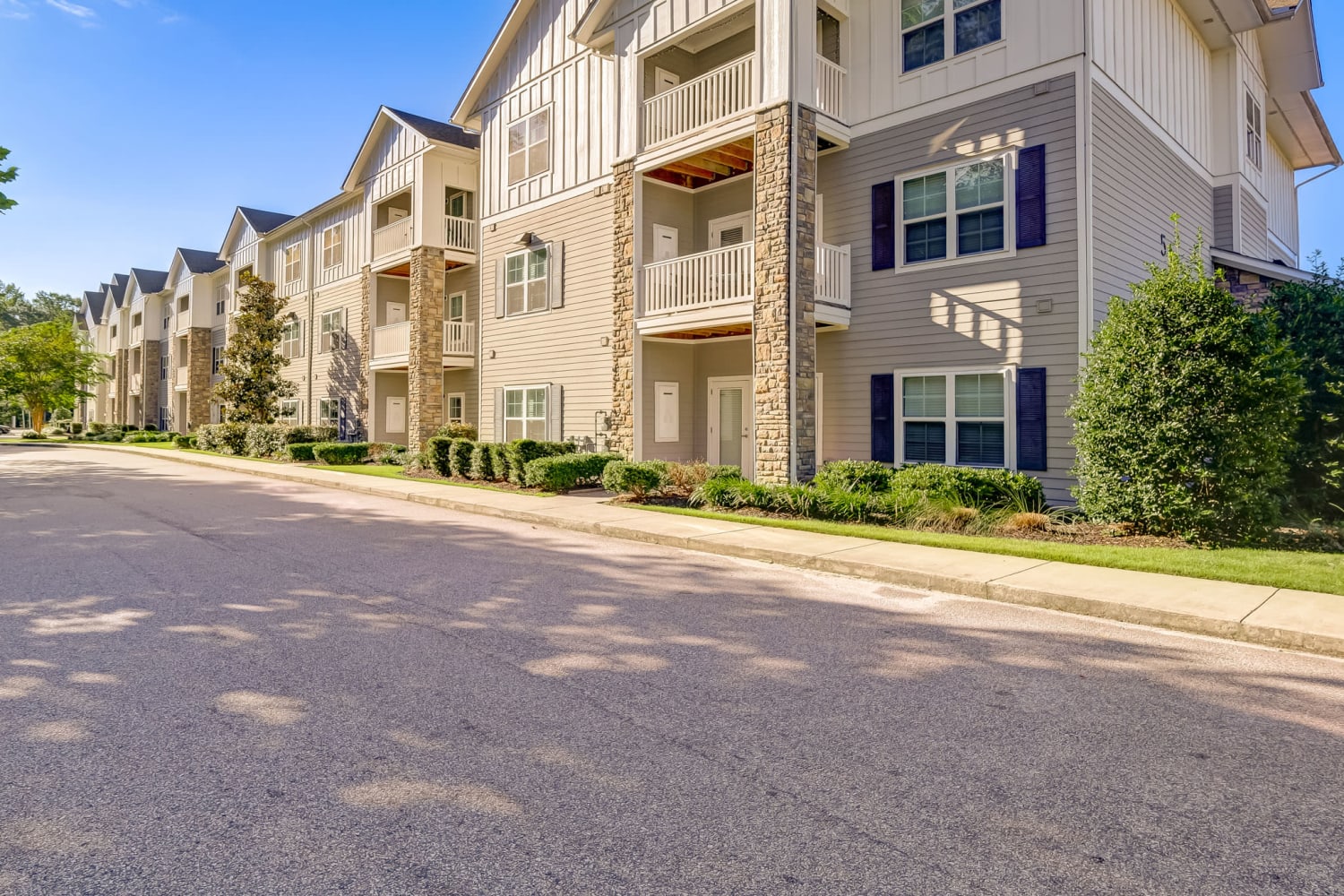 Street view of apartment building at Creekside at Greenlawn Apartment Homes in Columbia, South Carolina