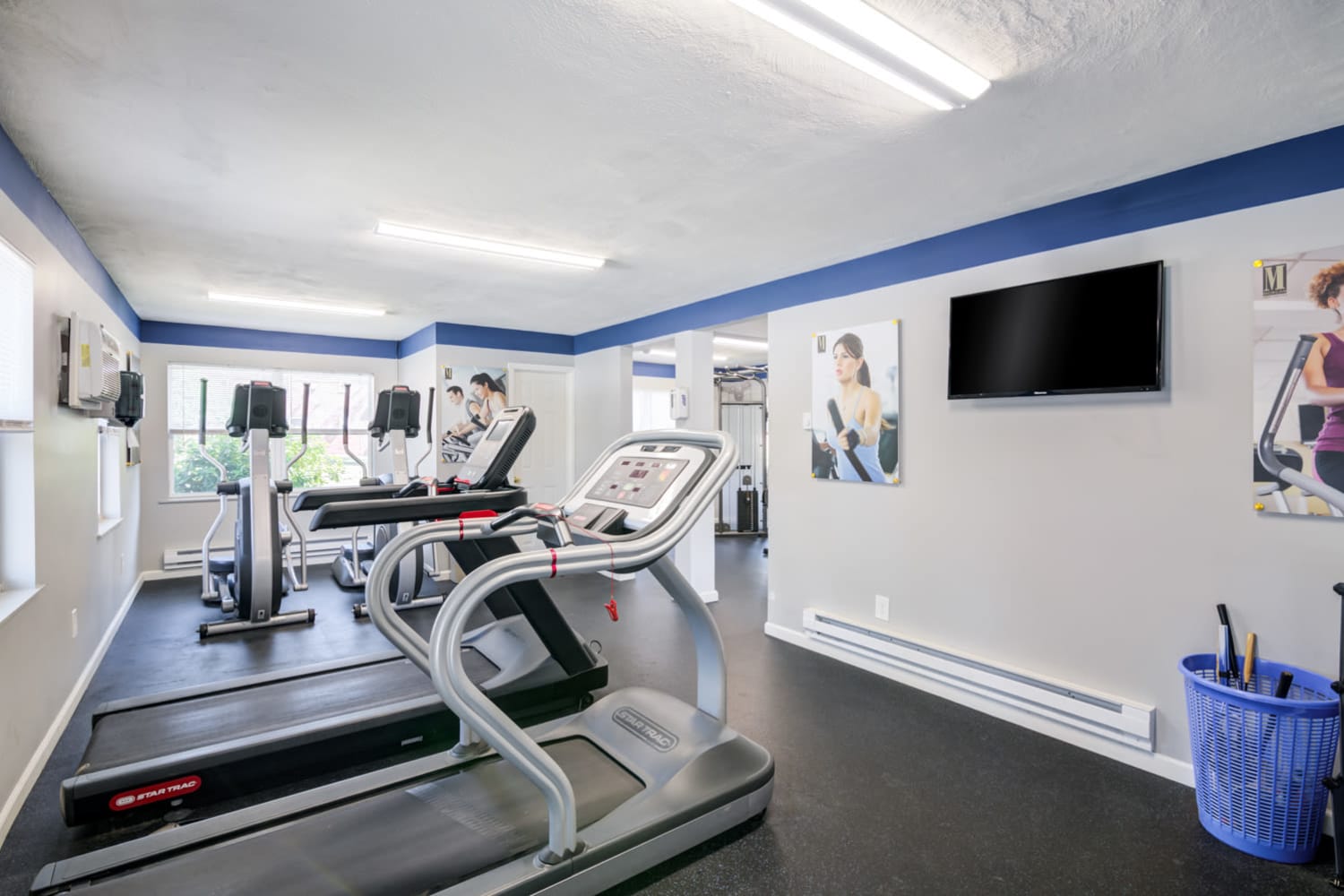 Fitness center with cardio machines at Eatoncrest Apartment Homes in Eatontown, New Jersey