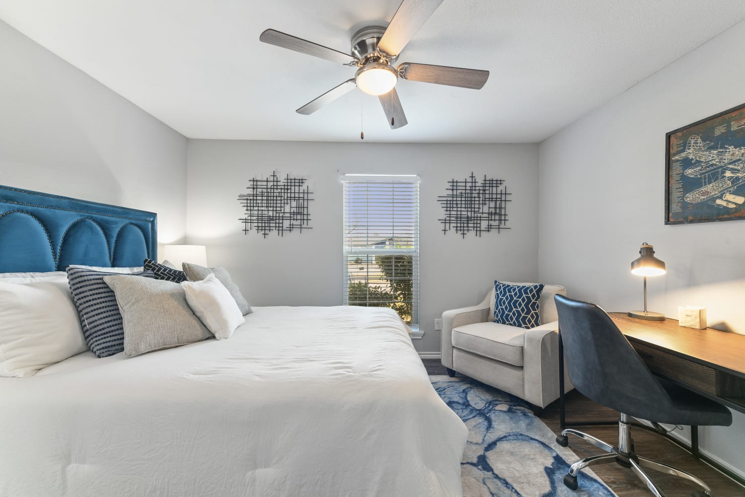Modern apartment with ceiling fan at The Broadway in Garland, Texas
