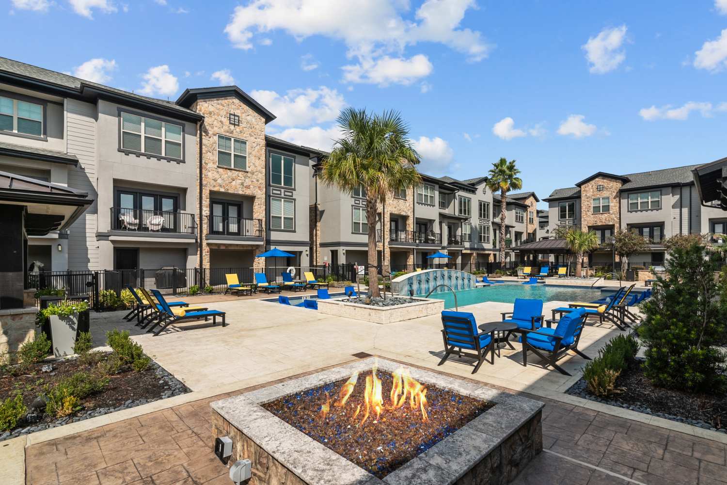 firepit by the pool at Arrabella in Houston, Texas