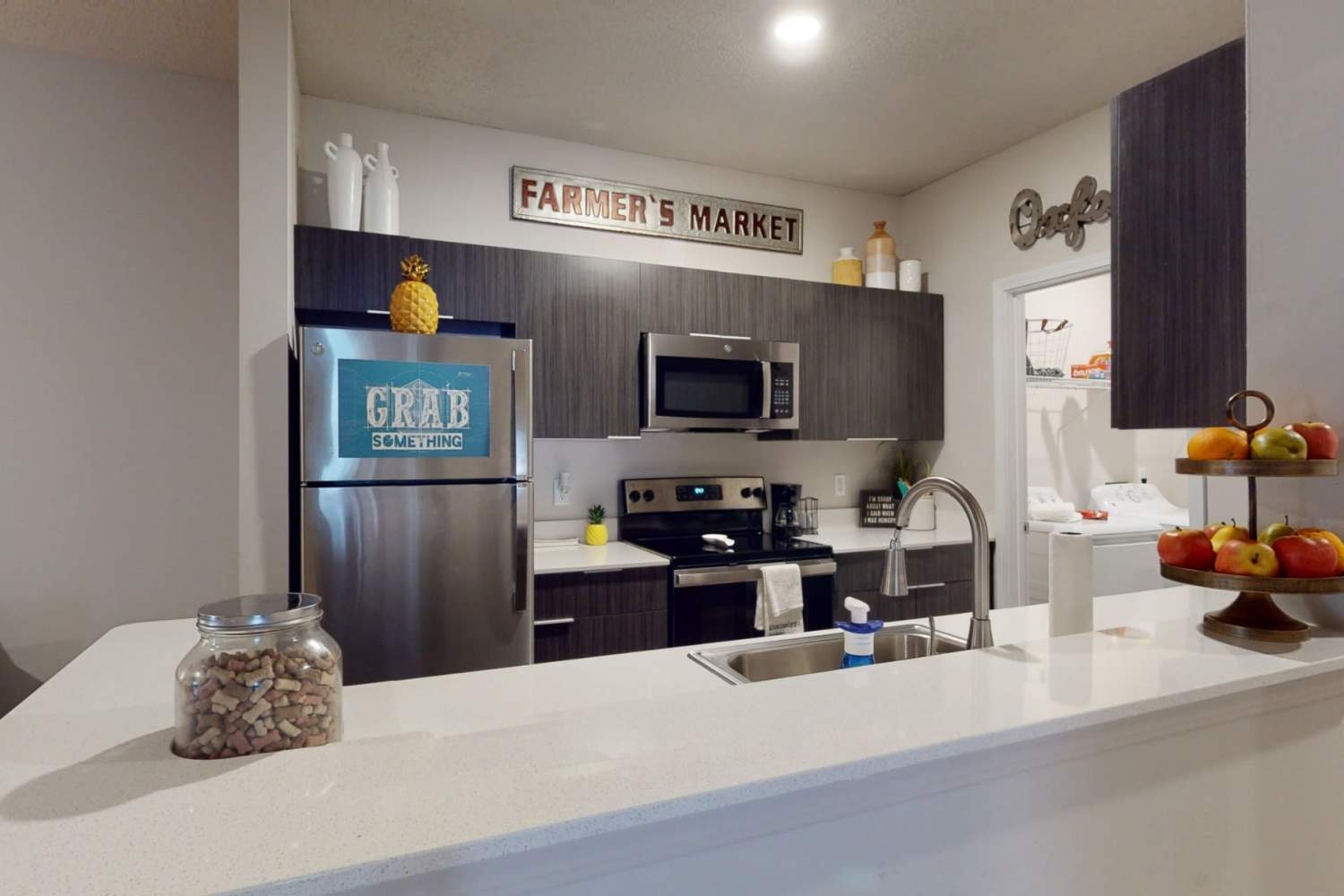 Apartment kitchen with all major appliances at The Quarters at Oxford in Oxford, Mississippi