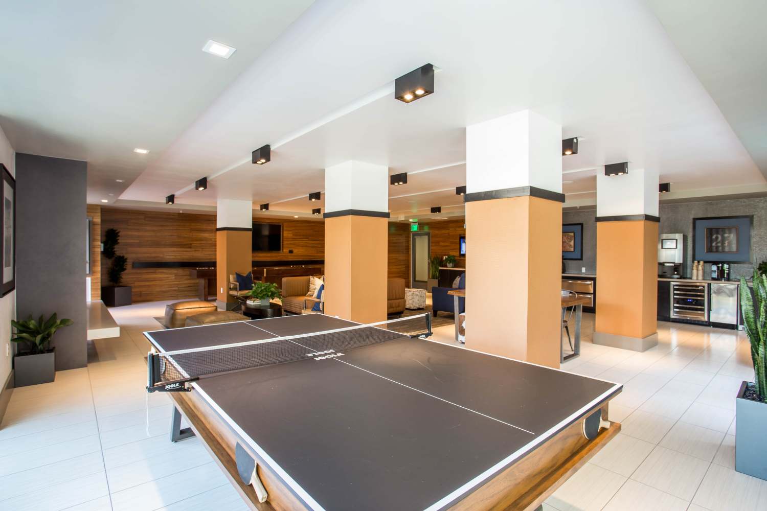 Bright recreation room with table tennis table at Franklin 299 in Redwood City, California