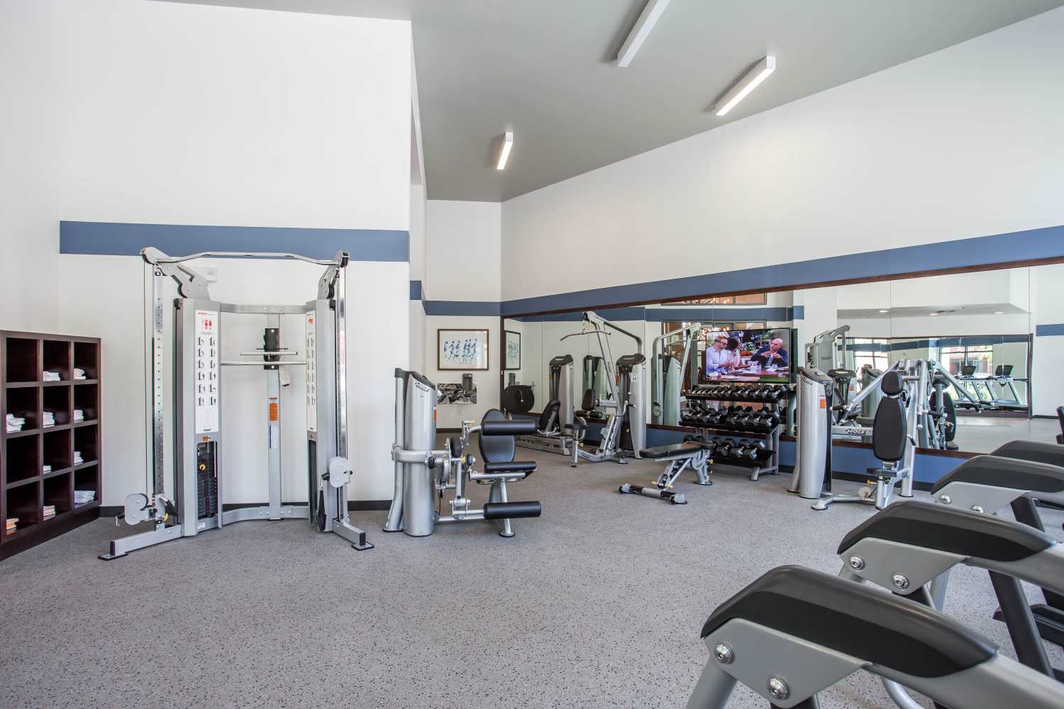 Well-equipped fitness studio with weight-lifting machines at Franklin 299 in Redwood City, California