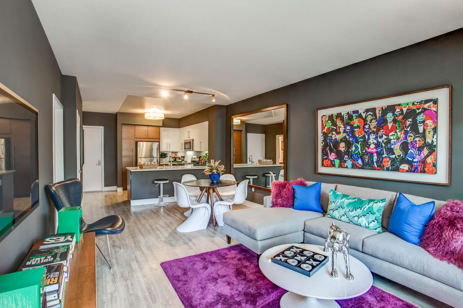 Living room with wood-style flooring, sofa and coffee table at Franklin 299 in Redwood City, California