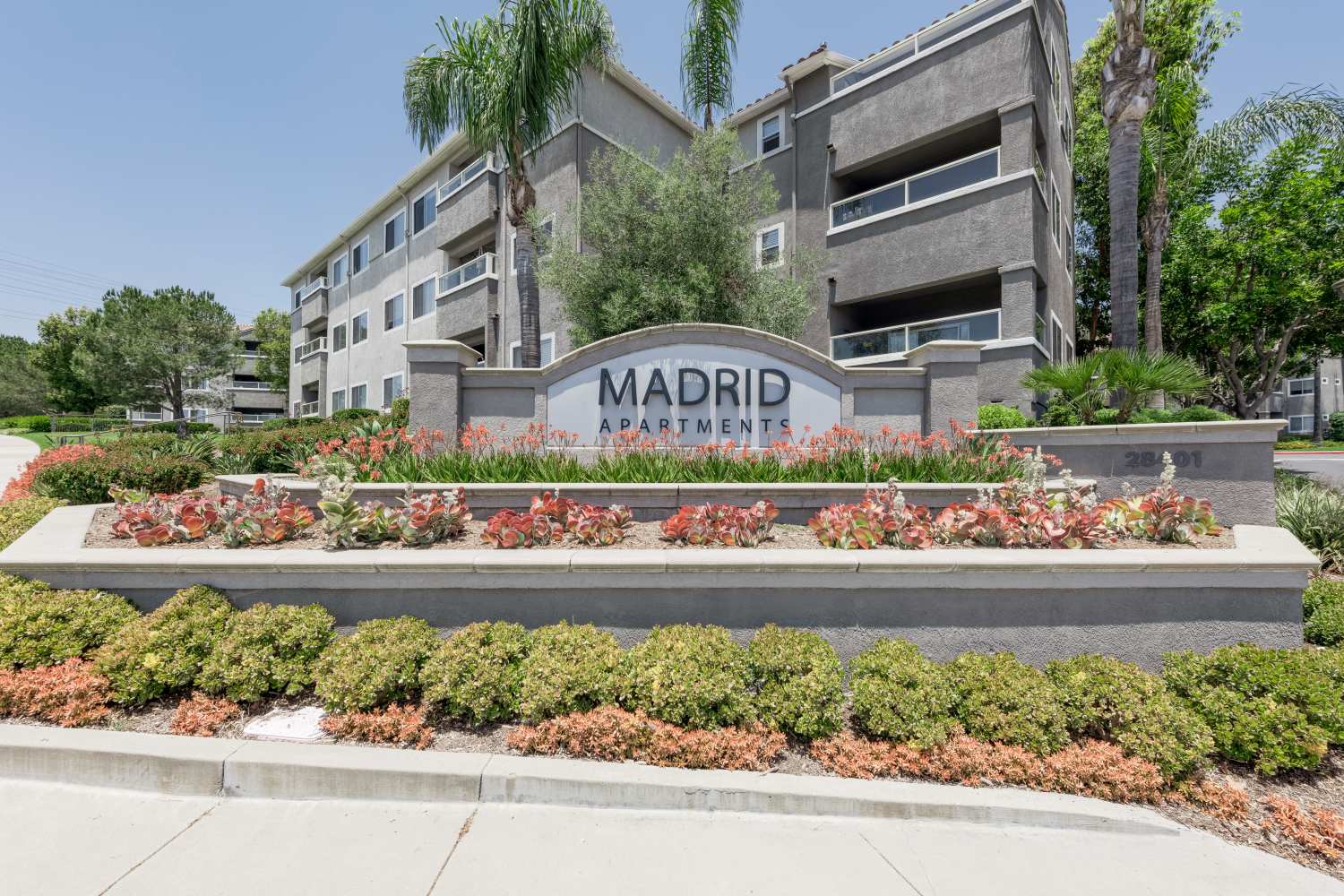 Front sign to Madrid Apartments in Mission Viejo, California