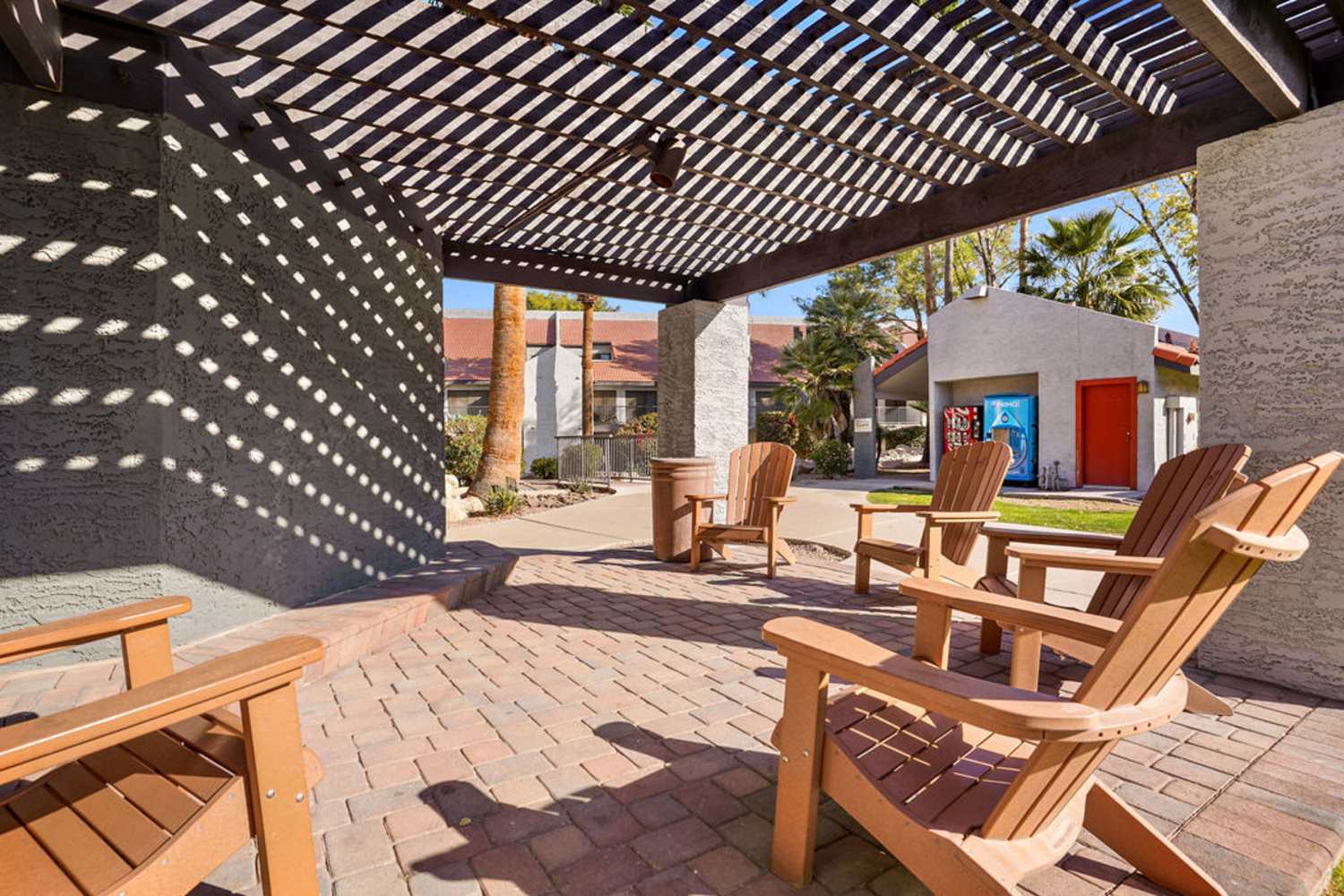 Outdoor wooden seats at Waterford Place Apartments in Mesa, Arizona