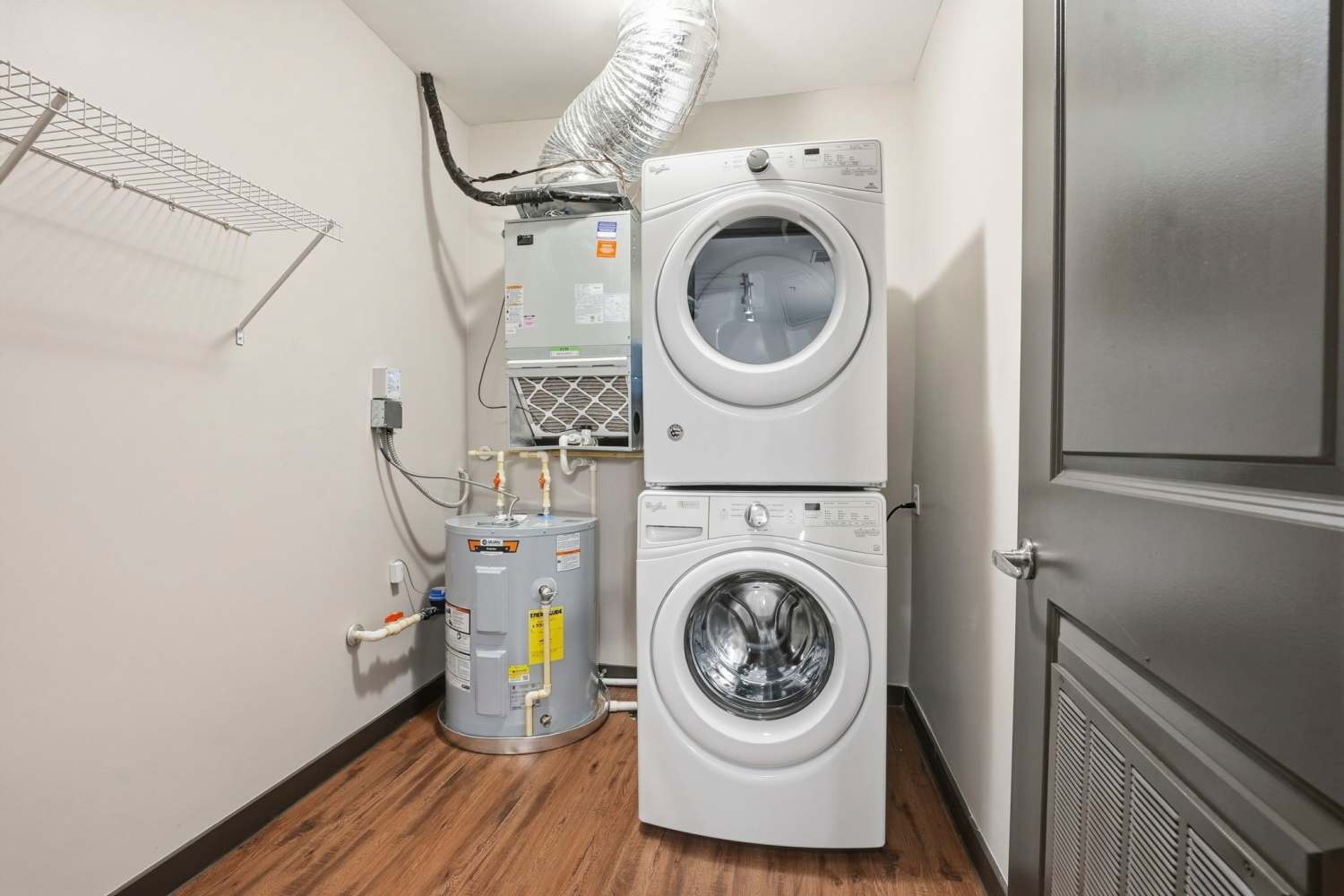 Stacked washer and dryer in a home at Bridge Park in Dublin, Ohio