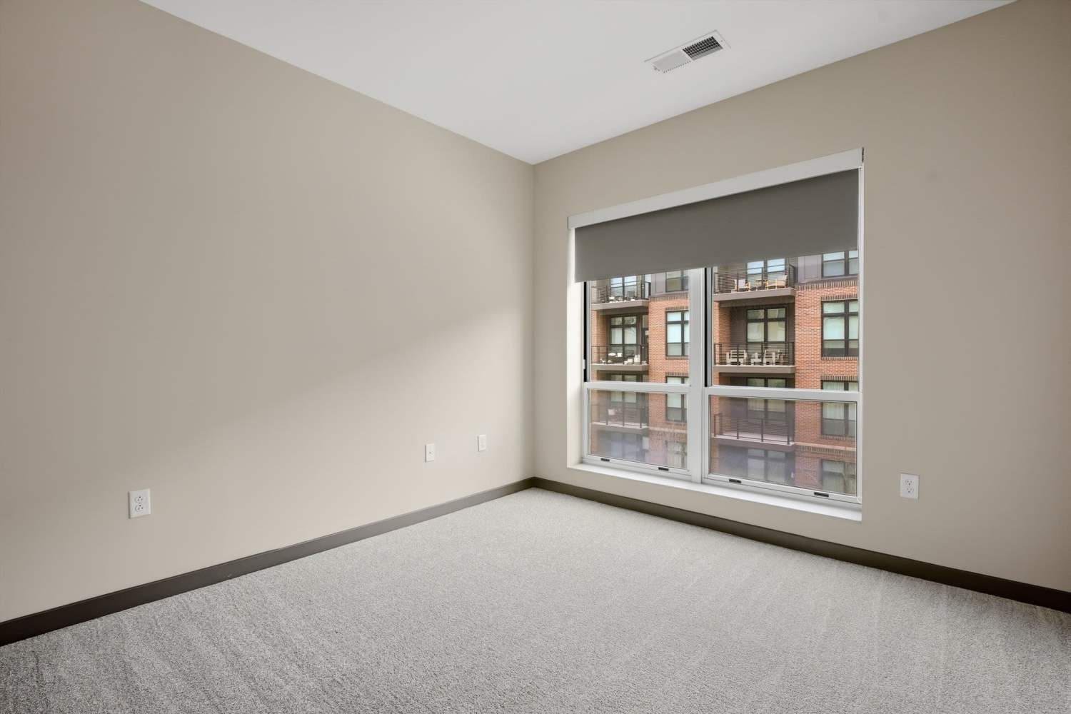 Tall windows in a bedroom at Bridge Park in Dublin, Ohio