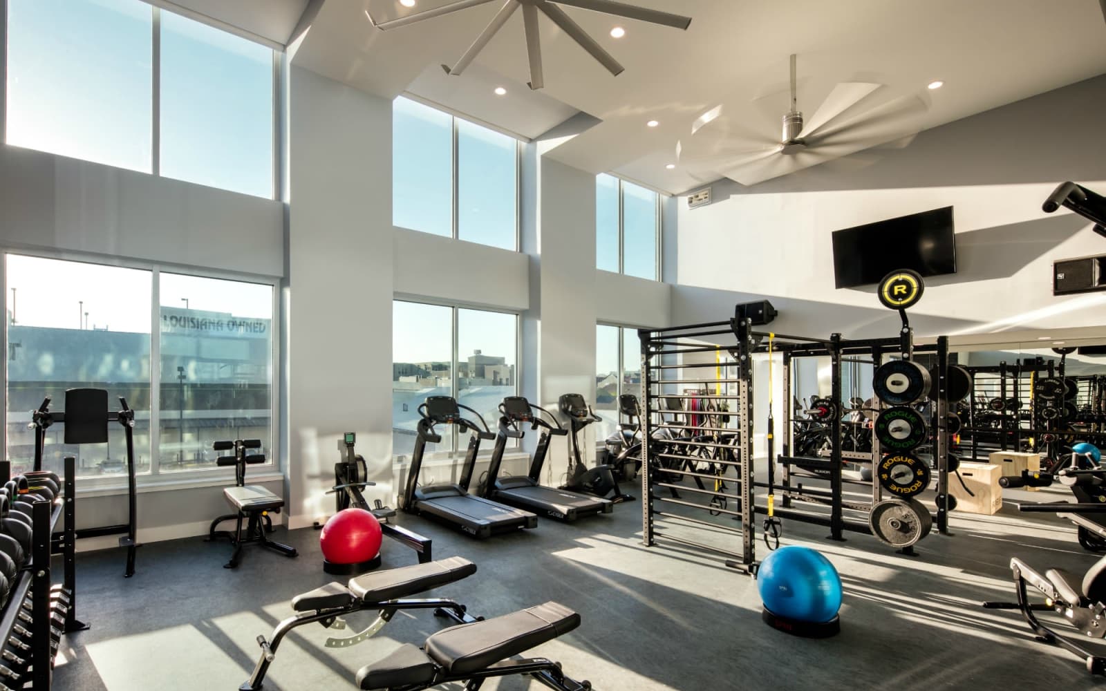 Fully-equipped fitness center at The Beacon at South Market in New Orleans, Louisiana