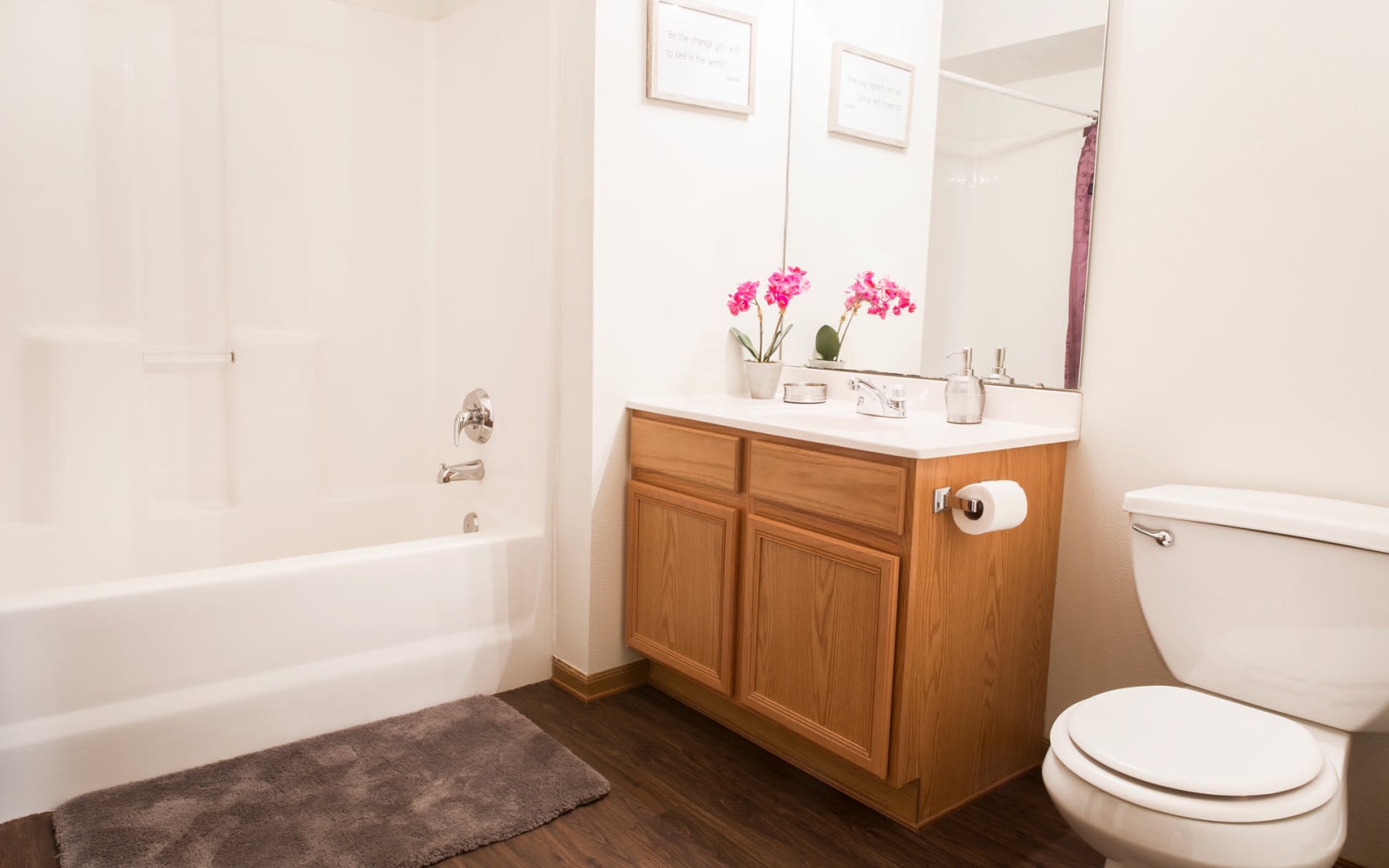 An apartment bathroom with a bathtub at Prairie Reserve in Cedar Rapids, Iowa