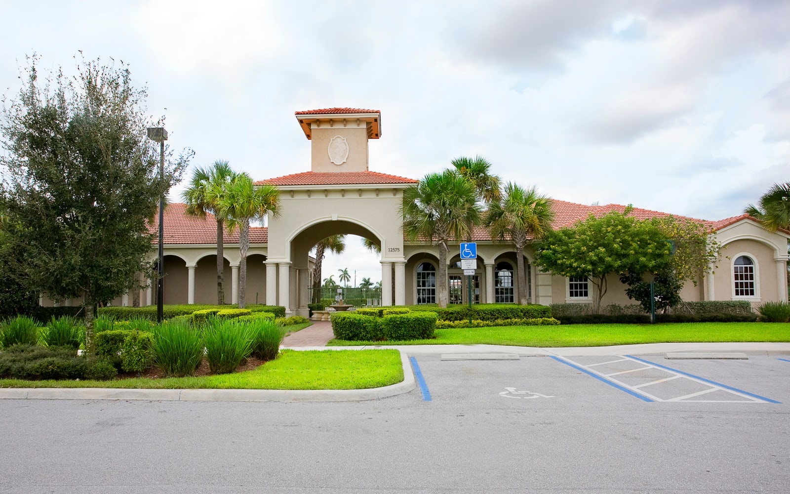 Front entrance parking at Green Cay Village in Boynton Beach, Florida
