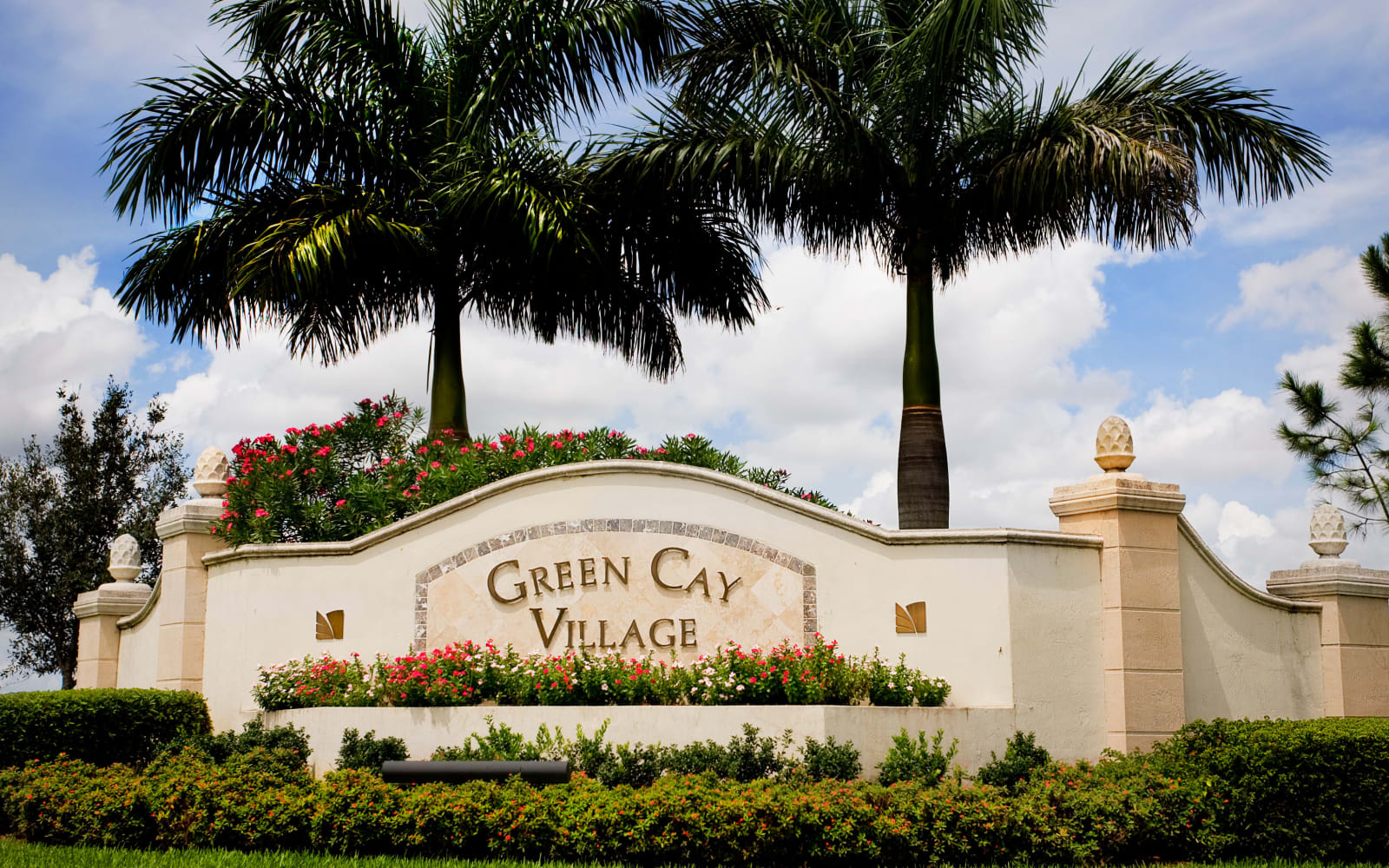 Exterior sign at Green Cay Village in Boynton Beach, Florida