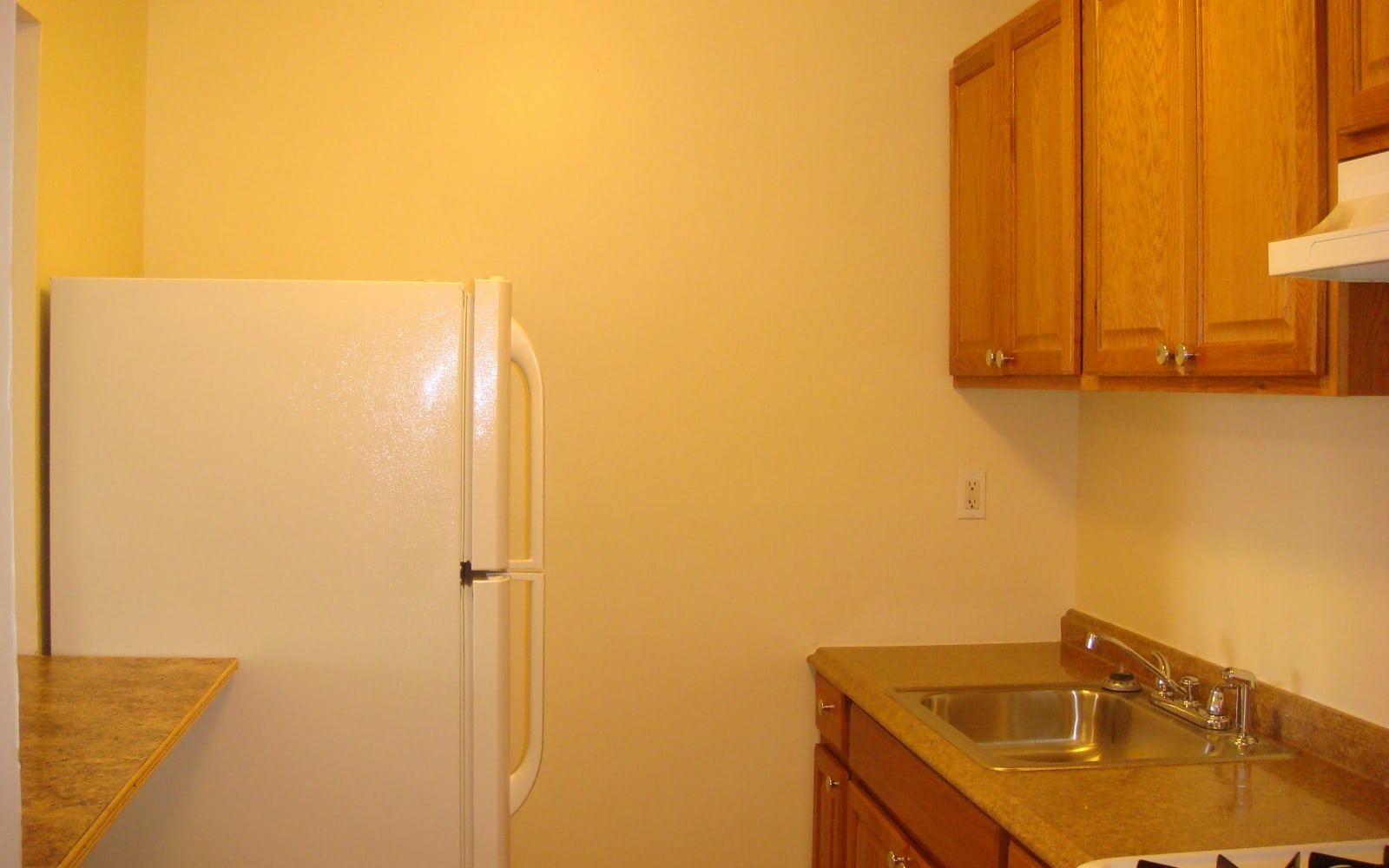 Refrigerator in the kitchen at DELETED - Ellsworth Apartments in Bridgeport, Connecticut
