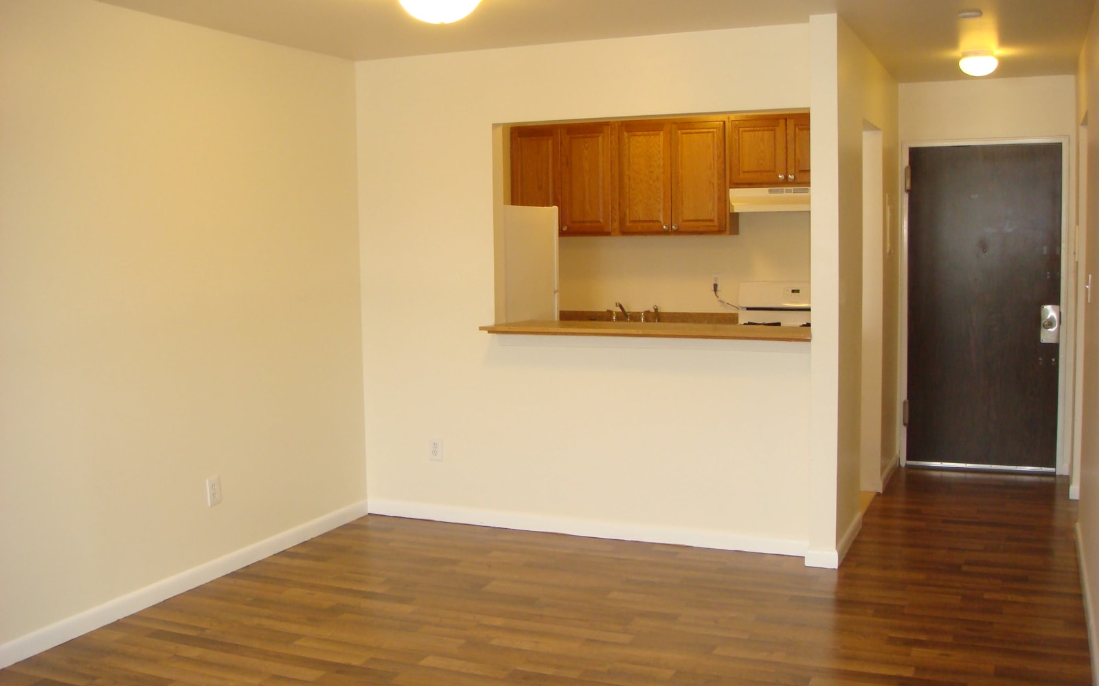 Open floor plan with a breakfast bar at DELETED - Ellsworth Apartments in Bridgeport, Connecticut