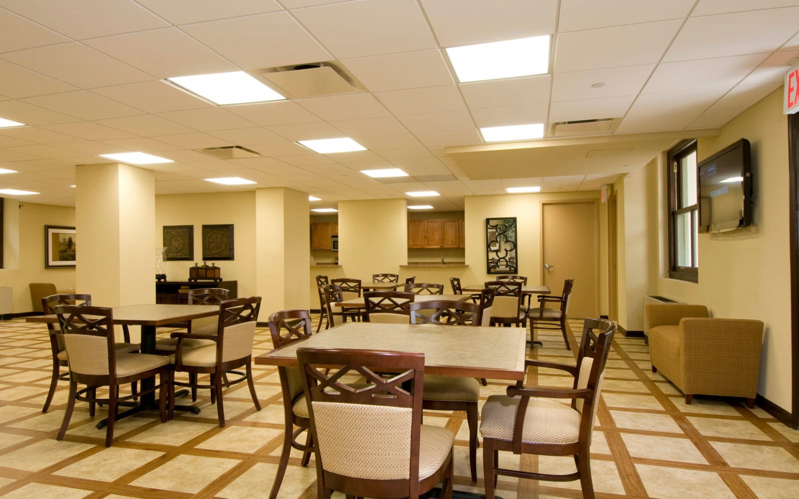 Community kitchen and dining area at Park Lane at Sea View in Staten Island, New York